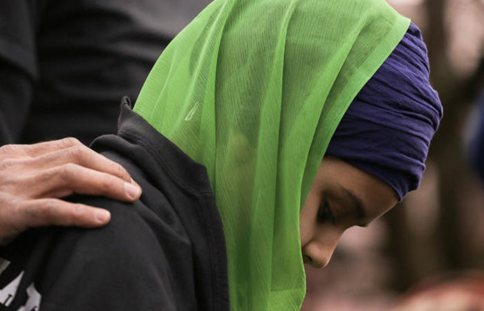 A Sikh boy listens during a vigil in honor of Srinivas Kuchibhotla, an immigrant from India who was recently shot and killed in Kansas, at Crossroads Park in Bellevue, Washington, U.S. March 5, 2017. — Reuters