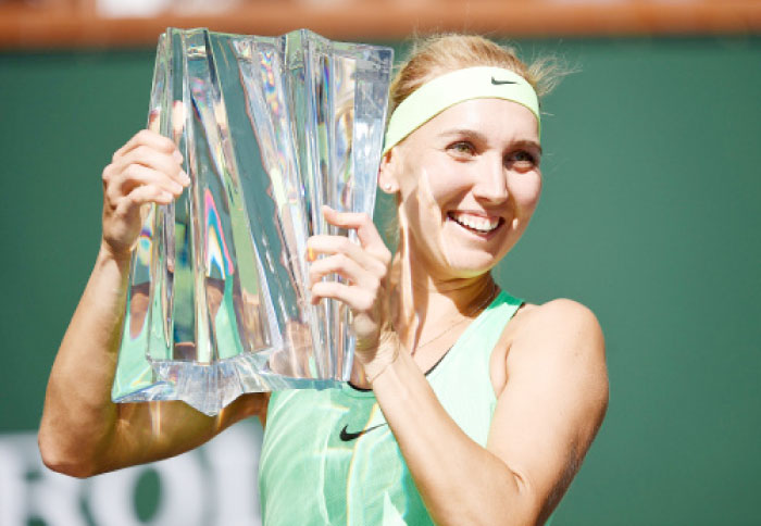 Elena Vesnina of Russia holds the BNP Paribas Open trophy after her three set victory against Svetlana Kuznetsova of Russia in the women’s final of the BNP Paribas Open at Indian Wells Tennis Garden on Sunday. — AFP