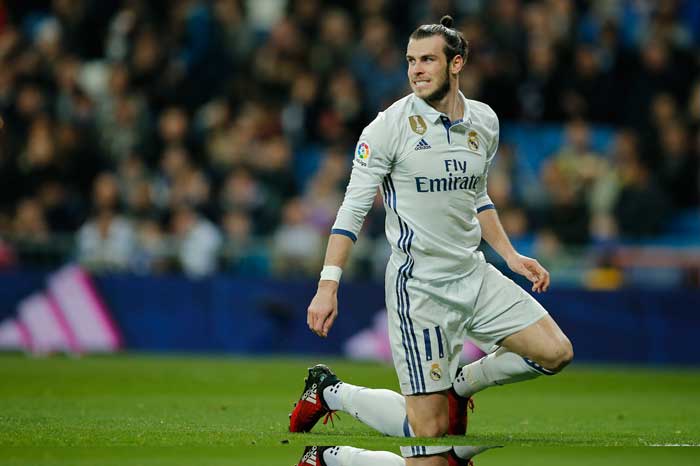 In this file photo, Real Madrid's Gareth Bale reacts during a Spanish La Liga soccer match at the Santiago Bernabeu stadium in Madrid, Spain. — AP