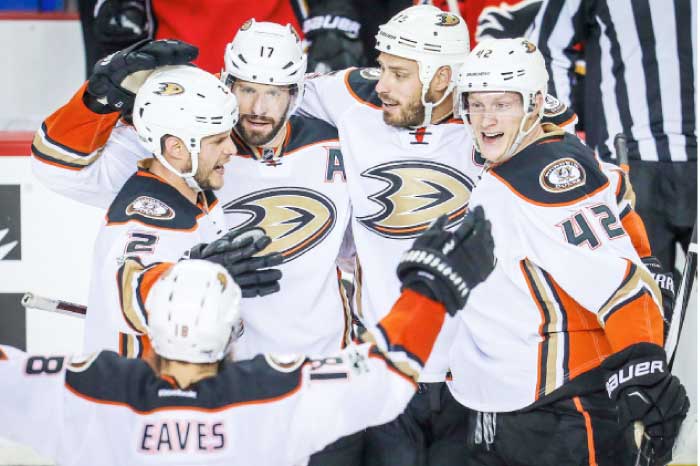 Anaheim Ducks’ players celebrate their victory over Calgary Flames after Game 4 of the 2017 Stanley Cup playoffs at Scotiabank Saddledome in Calgary Wednesday. — Reuters