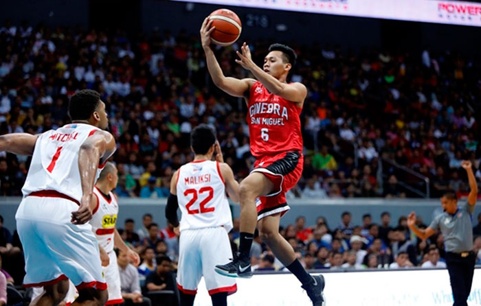 Ginebra's Scottie Thompson soars off Star import Tony Mitchell in their PBA Commissioner's Cup at the Mall of Asia Arena Sunday night.