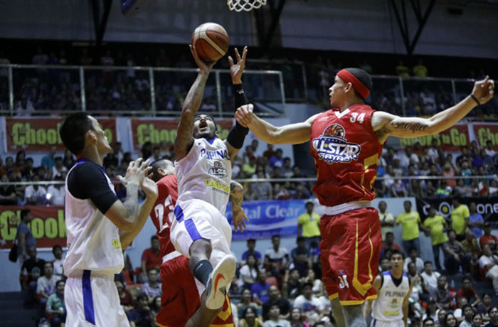 Gilas Pilipinas' Calvin Abueva fires an off-balance fade-away off PBA Visayas All-Stars' Chris Ellis in the PBA All-Star game in Lapulapu City Sunday night.
