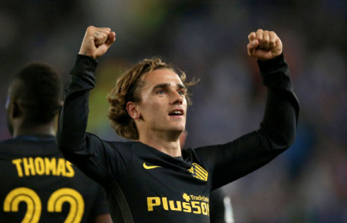 Atletico Madrid’s Antoine Griezmann celebrates a goal against Espanyol during their Spanish league football match in Cornella-El Prat, Barcelona), Saturday. — Reuters