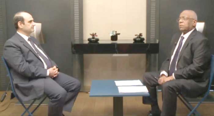 Iraqi judge Mounir Haddad with Al Arabiya News Channel’s Hassan Muawad. — Al Arabiya