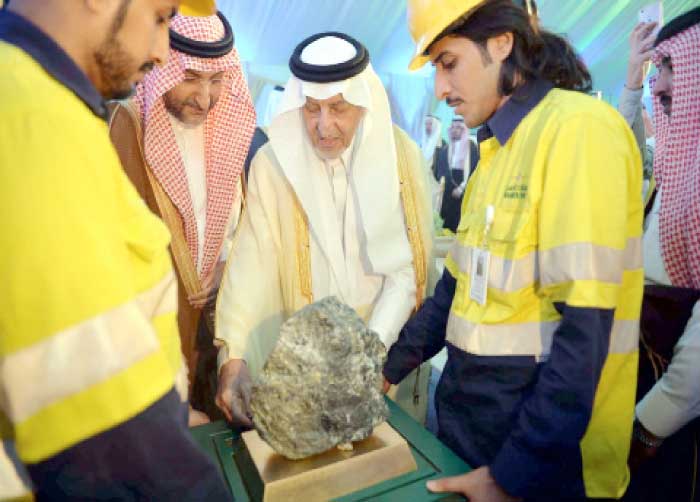 Emir of Makkah Prince Khaled Al-Faisal looks at a block of gold ore after launching Al-Duwaihi Gold Mine and Factory in Makkah. — SPA