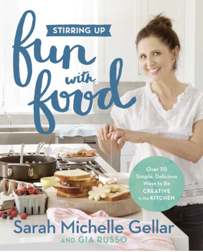 This cover image released by Grand Central Life & Style shows “Stirring Up Fun with Food: Over 115 Simple, Delicious Ways to Be Creative in the Kitchen,” by Sarah Michelle Gellar and Gia Russo. - AP