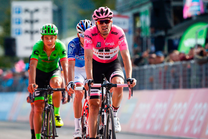 Dutch cyclist Tom Dumoulin (R) of Team Sunweb crosses the finish line at the end of the 19th stage of 100th Giro d'Italia, Tour of Italy, from San Candido to Piancavallo Friday. — AFP