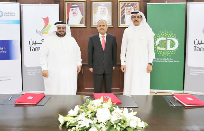 Khalid Al Aboudi, chief executive officer of the ICD, with Ibdar Bank and Tamkeen officials