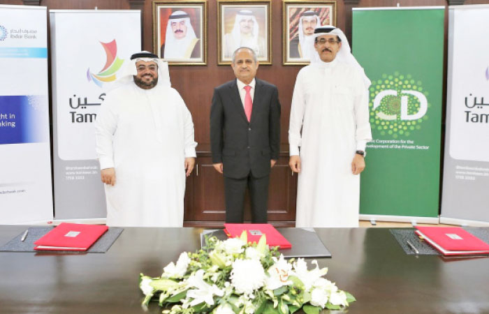 Khalid Al Aboudi, chief executive officer of the ICD, with Ibdar Bank and Tamkeen officials