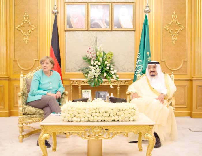 Custodian of the Two Holy Mosques King Salman and German Chancellor Angela Merkel witnessed an MoU to launch the SAP Cloud Hub. — AFP