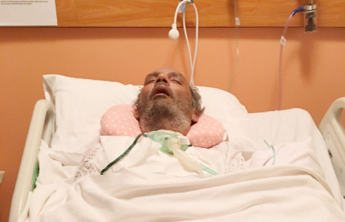 Once a highly productive mechanical engineer, Syed Javed Zakir now lies motionless in his hospital bed in Jeddah. — SG photo by Irfan Mohammed