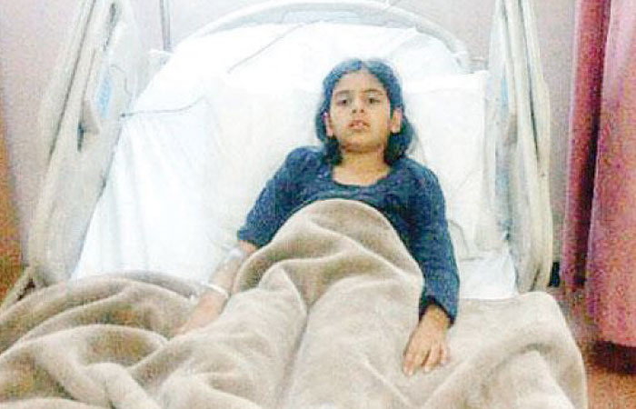 Ghadir Al-Wadei while receiving treatment at King Faisal Hospital in Taif after she was hit by a stray bullet on the eve of Eid Al-Fitr in 2013.