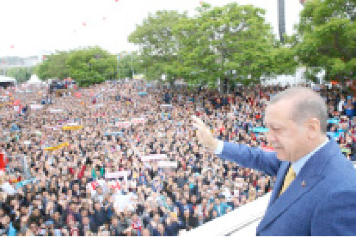 Turkish President Tayyip Erdogan waves to the crowd during the Extraordinary Congress of the ruling AK Party (AKP) in Ankara, Turkey, on Sunday. — Reuters