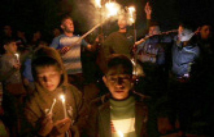 Gaza residents are engulfed by darkness and have to rely on generators or batteries for the post-sundown family meals. — AP