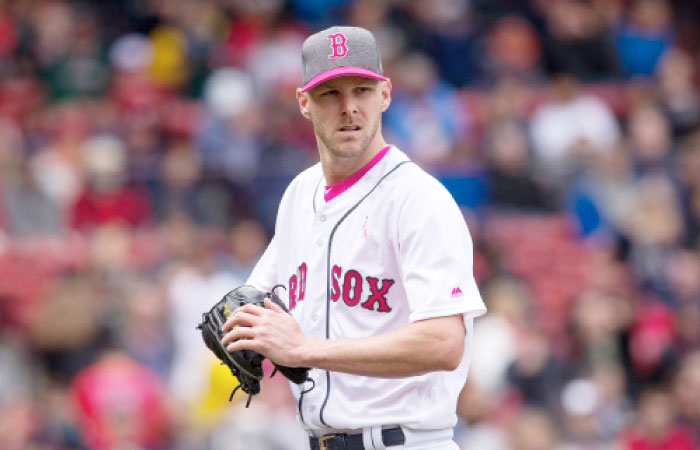 Chris Sale of the Boston Red Sox walks toward the dugout during the second inning of a game against the Tampa Bay Rays at Fenway Park in Boston Saturday. — AFP