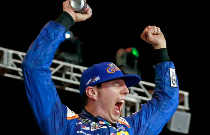 Kyle Busch celebrates in victory lane after winning the Monster Energy NASCAR All Star Race at Charlotte Motor Speedway Saturday. — AFP