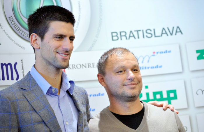 This file photo taken on November 14, 2012 shows Serbian tennis player Novak Djokovic (L) posing with his coach Marian Vajda during a press conference in Bratislava. — AFP