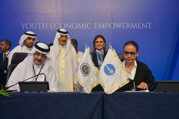 ICD CEO Khaled Al-Aboodi and Ms. Heba Salama, director of COMESA Regional Investment Agency, signed MoU in Jeddah. Also seen is IDB President Dr. Bandar M.H. Hajjar, center. — Courtesy photo