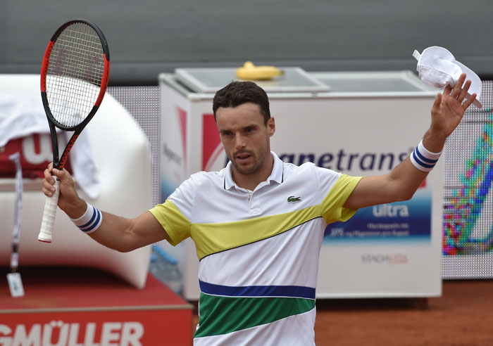 Spain's Roberto Bautista Agut celebrates after winning his match against German player Yannick Hanfmann at the ATP Tour in Munich Friday. — AP