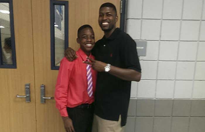 This undated family photo provided by Edwards family attorney Lee Merritt shows Jordan Edwards, left, posing for a photo with his father, Odell Edwards. — AP