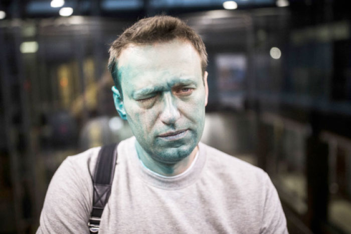 Russian opposition leader Alexei Navalny poses for a photo after unknown attackers doused him with green antiseptic outside a conference venue in Moscow in this April 27, 2017 file photo. — AP