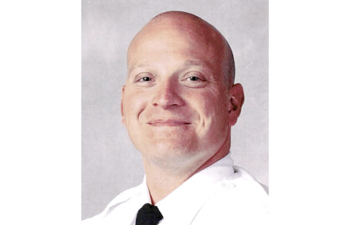 This June 22, 2015 file photo provided by the Ohio Police shows the official portrait of police officer Bryan Mason. — AP