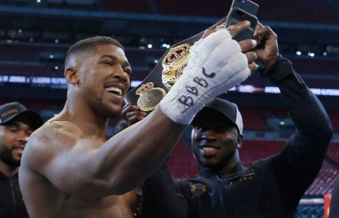 Anthony Joshua takes a selfie video after the fight against Wladimir Klitschko at Wembley Stadium, London. — Reuters