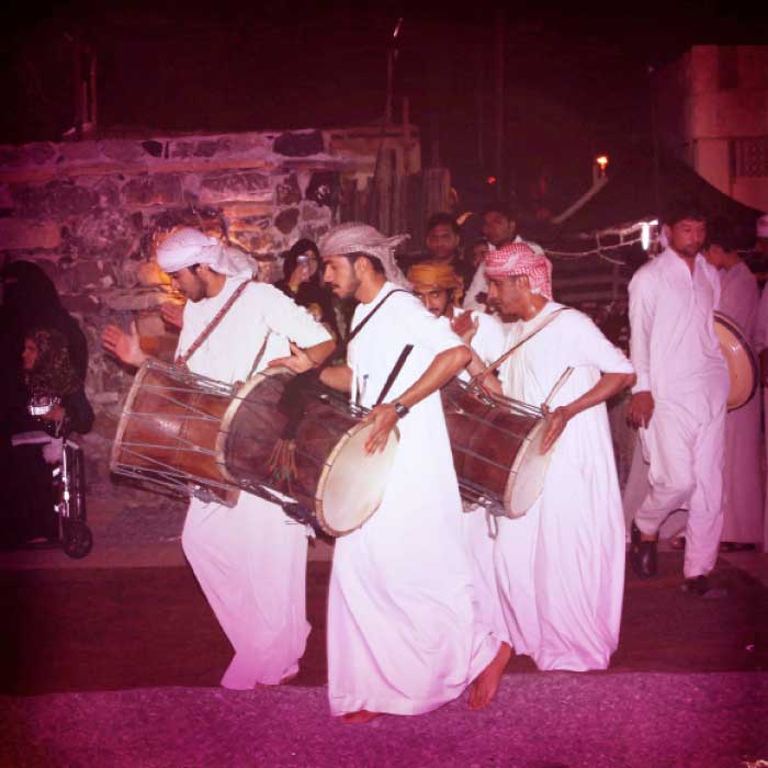 Emirati dancers perform a folklore dance during Sharjah Heritage Days.