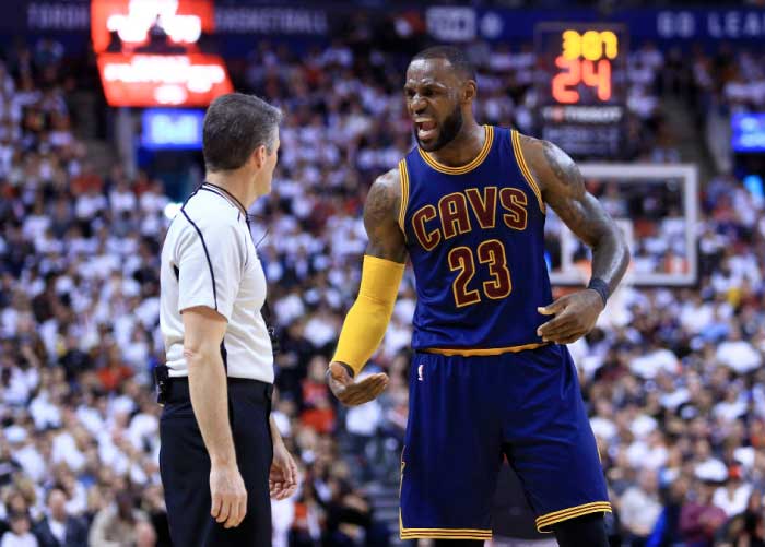 Lebron James No. 23 of the Cleveland Cavaliers reacts to a call by an official in the second half of Game Four of the Eastern Conference Semifinals against the Toronto Raptors during the 2017 NBA Playoffs at Air Canada Centre on Sunday, in Toronto, Canada. — AFP