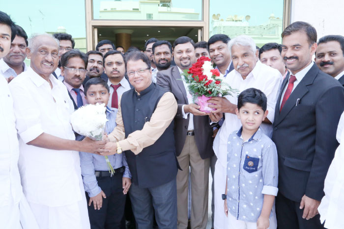 Former Chief Minister of Kerala Oommen Chandy and his Cabinet colleague former Cultural and NRI Minister K.C. Joseph being felicitated by Al-Muna International School management, staff and students in Dammam. — Courtesy photo