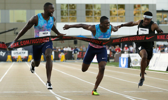 Justin Gatlin (L) reacts as he defeats Christian Coleman (C) in the men's 100-meter final at the US Track and Field Championships in Sacramento Friday. Mike Rodgers (R) finished sixth. — AP