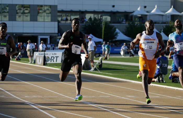 Tyson Gay (R) races against Christian Coleman (2nd R) Jeff Demps (2nd L) and LeShon Collins in a heat of the first round of the men's 100 meters at the US Track and Field Championships in Sacramento Thursday. — AP