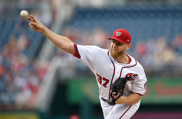 Washington Nationals starter Stephen Strasburg delivers a pitch during the first inning of their game against the Chicago Cubs in Washington Wednesday. — AP