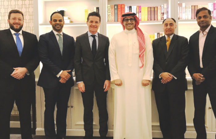 Officials of the Jabal Omar Development Company and Emaar Hospitality Group pose for a photograph. — Courtesy photo
