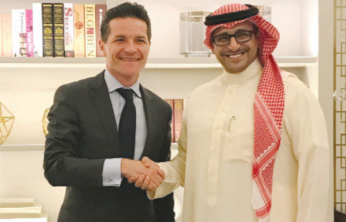 Olivier Harnisch (left), Chief Executive Officer of Emaar Hospitality Group, and Yasser Faisal Al-Sharif, Chief Executive Officer of Jabal Omar Development Company, shake hands at the signing of management agreement