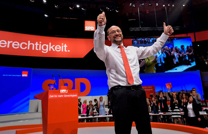 Martin Schulz, chairman of Germany's social democratic SPD party and candidate for chancellor poses on stage during an SPD party congress in Dortmund, western Germany, on Sunday. — AFP