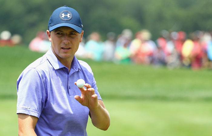 Jordan Spieth of the US acknowledges the crowd after putting on the ninth green during the second round of the Travelers Championship in Cromwell, Connecticut, Friday. — AFP