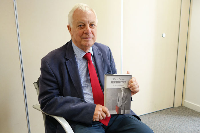 Hong Kong's last British colonial governor Chris Patten poses at his book launch in central London on Monday. — AFP