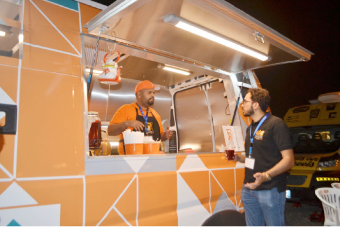 Tariq Abdullah serving his customers from inside his truck.