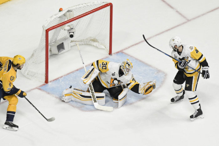 Pittsburgh Penguins’ goalie Matt Murray (C) makes a glove save against the Nashville Predators in Game 4 Stanley Cup Finals at Bridgestone Arena in Nashville Tuesday. — Reuters