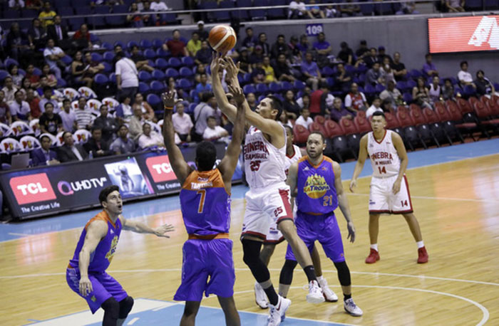 Barangay Ginebra's Japeth Aguilar fires a shot against TNT in Game 3 of their PBA Commissioner's Cup semifinal series at the Smart Araneta Coliseum Thursday night.