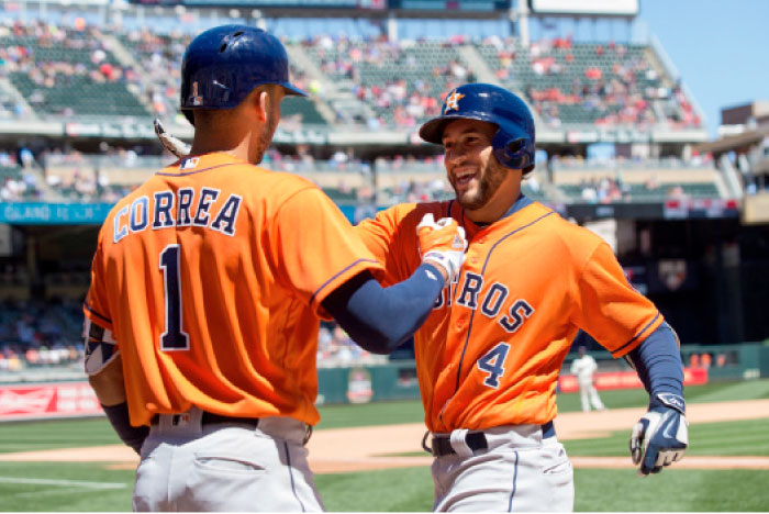 Houston Astros outfielder George Springer (R) celebrates his home run in the seventh inning against the Minnesota Twins at Target Field in Minneapolis Wednesday. — Reuters