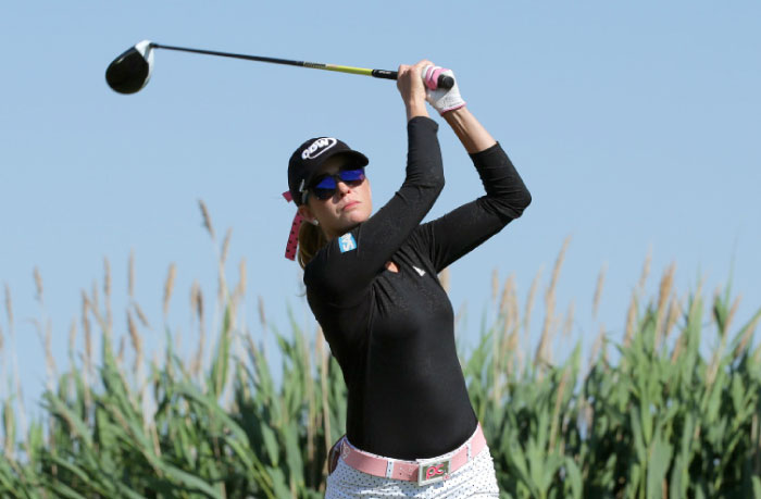 Paula Creamer hits her tee shot on the third hole during the second round of the ShopRite LPGA Classic in Galloway, New Jersey, Saturday. — AFP