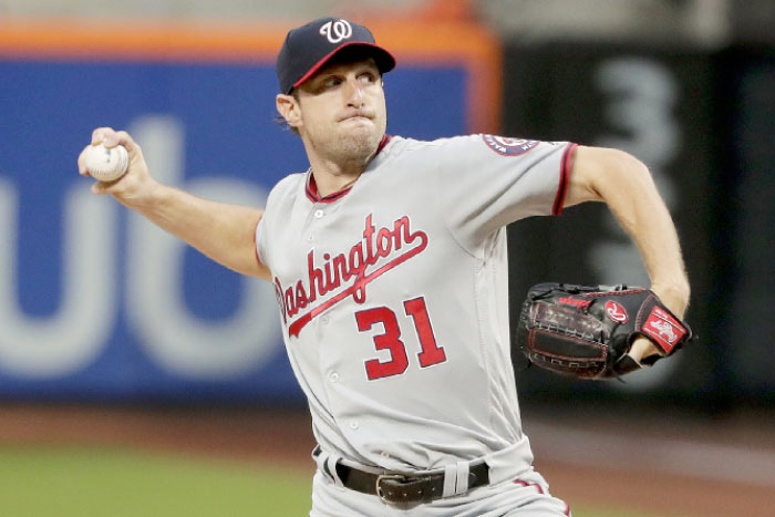 Washington Nationals’ pitcher Max Scherzer delivers against the New York Mets during their MLB game in New York Friday. — AP