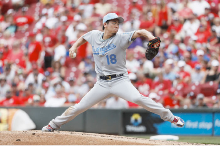 Los Angeles Dodgers’ starting pitcher Kenta Maeda throws in the second inning of a baseball game against the Cincinnati Reds in Cincinnati Sunday. — AP