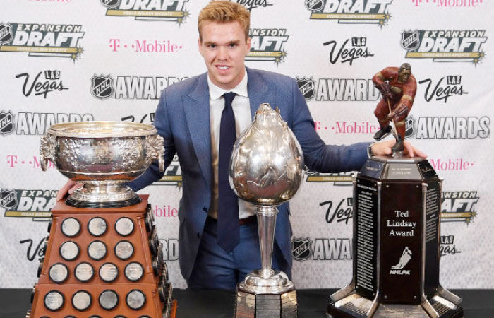 Edmonton Oilers’ forward Connor McDavid poses for a photo with the Art Ross Trophy (L), Hart Trophy (C) and Ted Lindsay Award during the 2017 NHL Awards and Expansion Draft at T-Mobile Arena in Las Vegas Wednesday. — Reuters