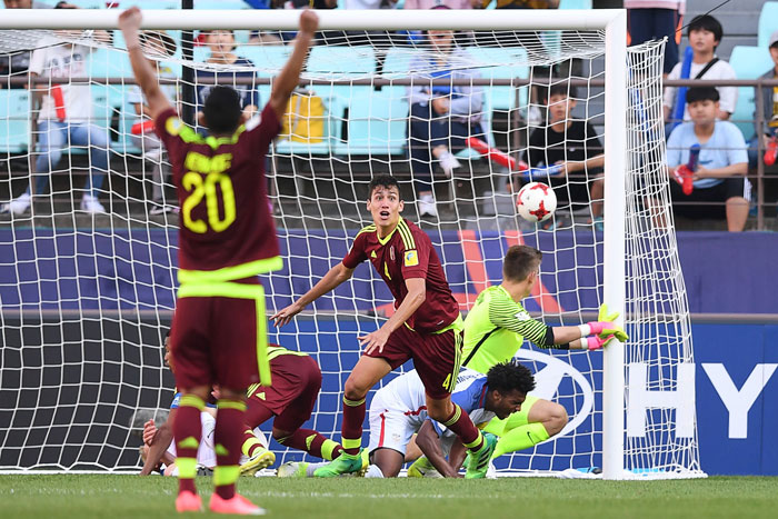 Venezuela's defender Nahuel Ferraresi (C) reacts after scoring during their U-20 World Cup quarterfinal football match against the US in Jeonju, South Korea, Sunday. — AFP