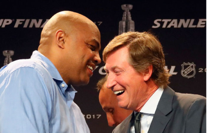 Former NBA player Charles Barkley, left, and NHL Centennial Ambassador Wayne Gretzky speak during a press conference prior to Game Four of the 2017 NHL Stanley Cup Final between the Pittsburgh Penguins and the Nashville Predators at the Bridgestone Arena on Monday in Nashville, Tennessee. — AFP