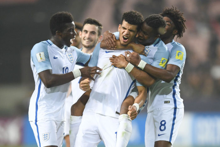 England’s forward Dominic Solanke celebrates his goal with teammates during the U-20 World Cup semifinal match against Italy in Jeonju Thursday. — AFP