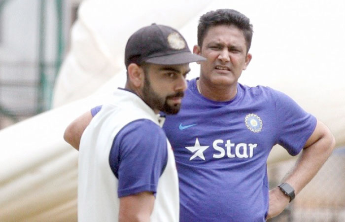 Virat Kohli (L) and Anil Kumble